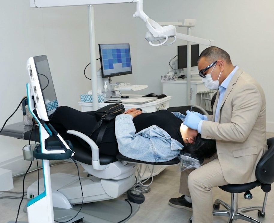 Dr. Singh performing a one-on-one orthodontic exam