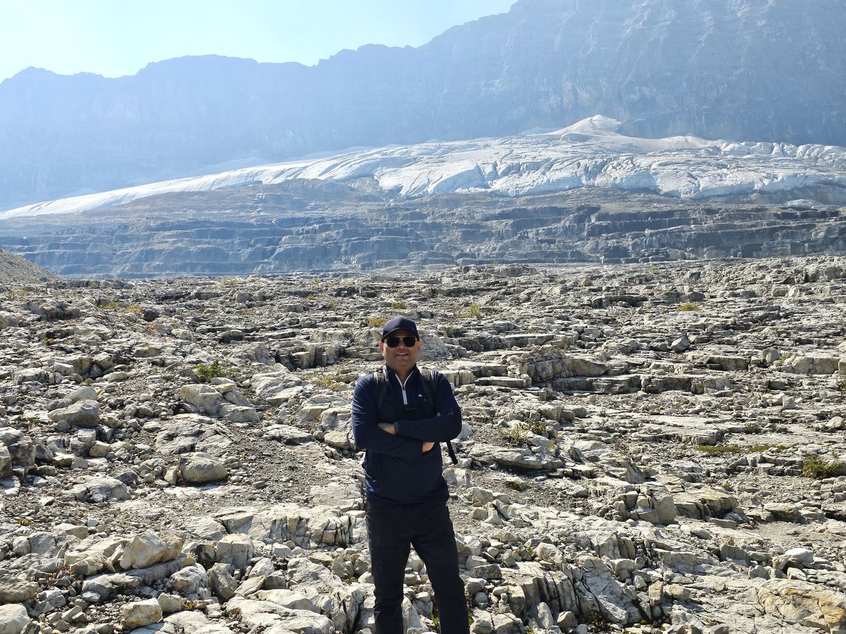 Dr. Singh trekking on a glacier field